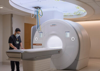 Nature imagery above the patient in an open MRI machine taps into biophilia to relieve stress.