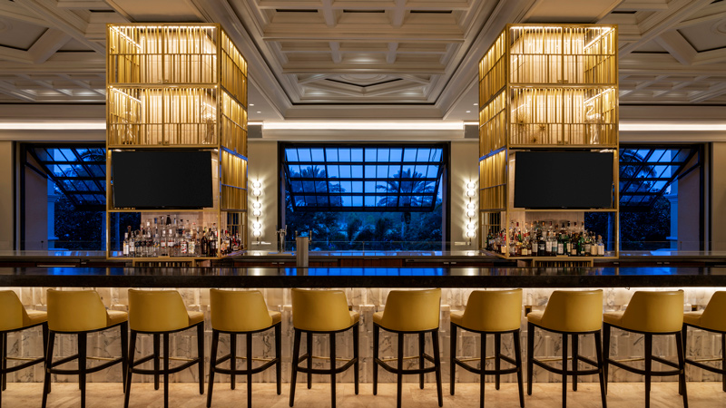 Elegant lobby bar at The Ritz-Carlton Grande Lakes, designed by LEO A DALY