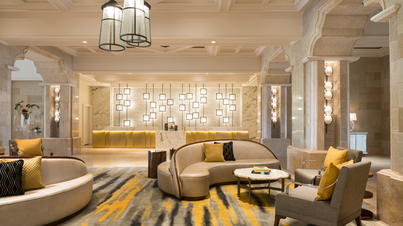 Front desk and lounge seating at The Ritz-Carlton Grande Lakes, designed by LEO A DALY
