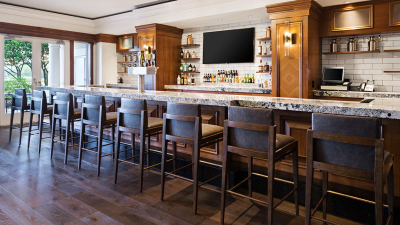 Taphouse bar at The Ritz-Carlton Grande Lakes, designed by LEO A DALY